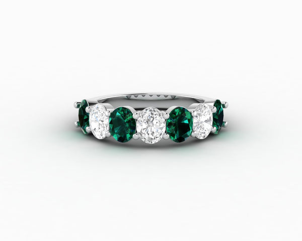 Ivy 2.5 Ct Oval Cut Moissanite and Green Emerald Half Eternity Wedding Band