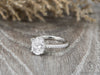 Larisa 1.5 Ct Oval Cut Engagement Ring with Side Stones