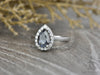 Aureola 1.50 Ct Pear Cut Halo Grey Moissanite Engagement Ring