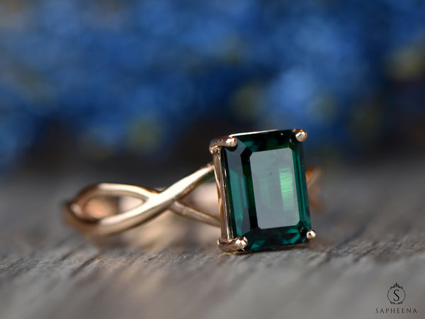 Viola 1.2 Ct Twisted Solitaire Emerald Cut Green Emerald Engagement Ring